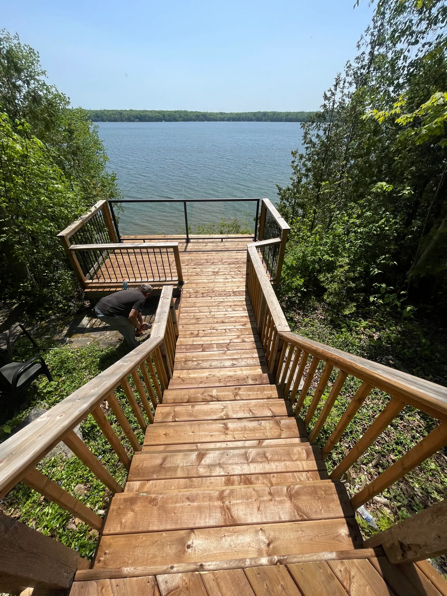 Wood stairs and lakeside lookout after repairs