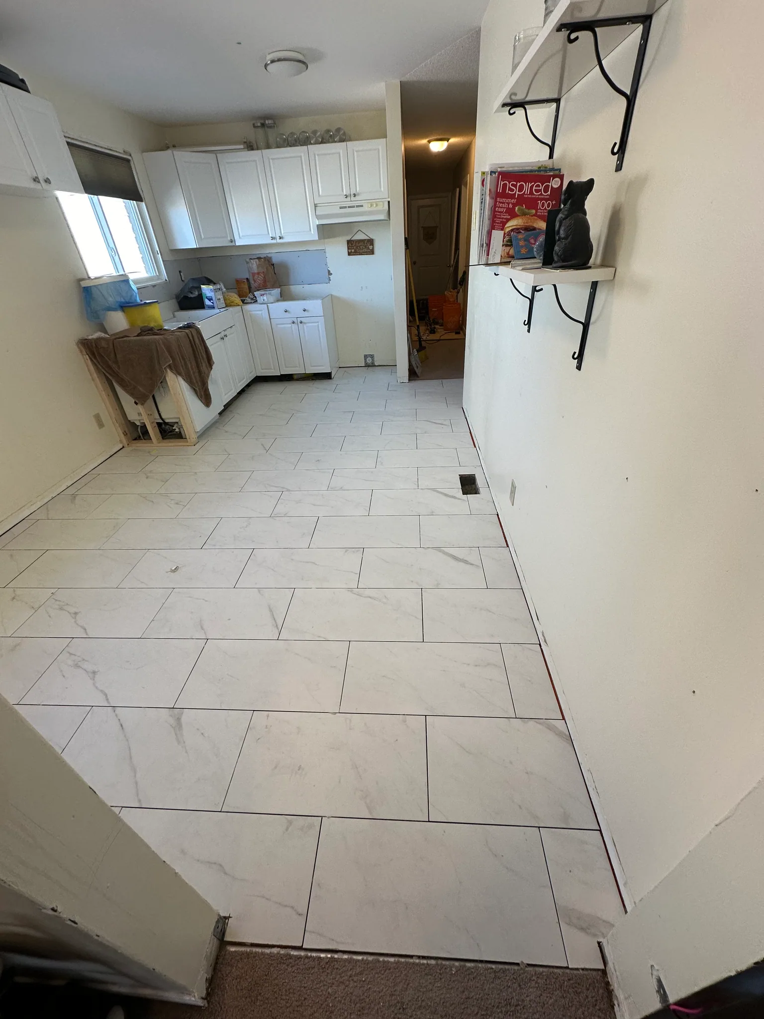 White tile flooring in a kitchen